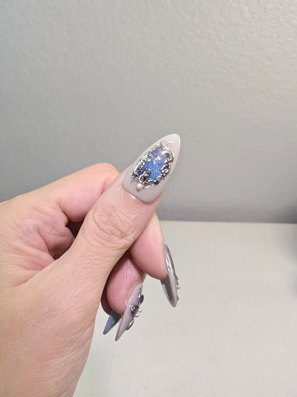 Silver and Blue Cat Eye Crystal With Floral Medium Almond Press On Nails